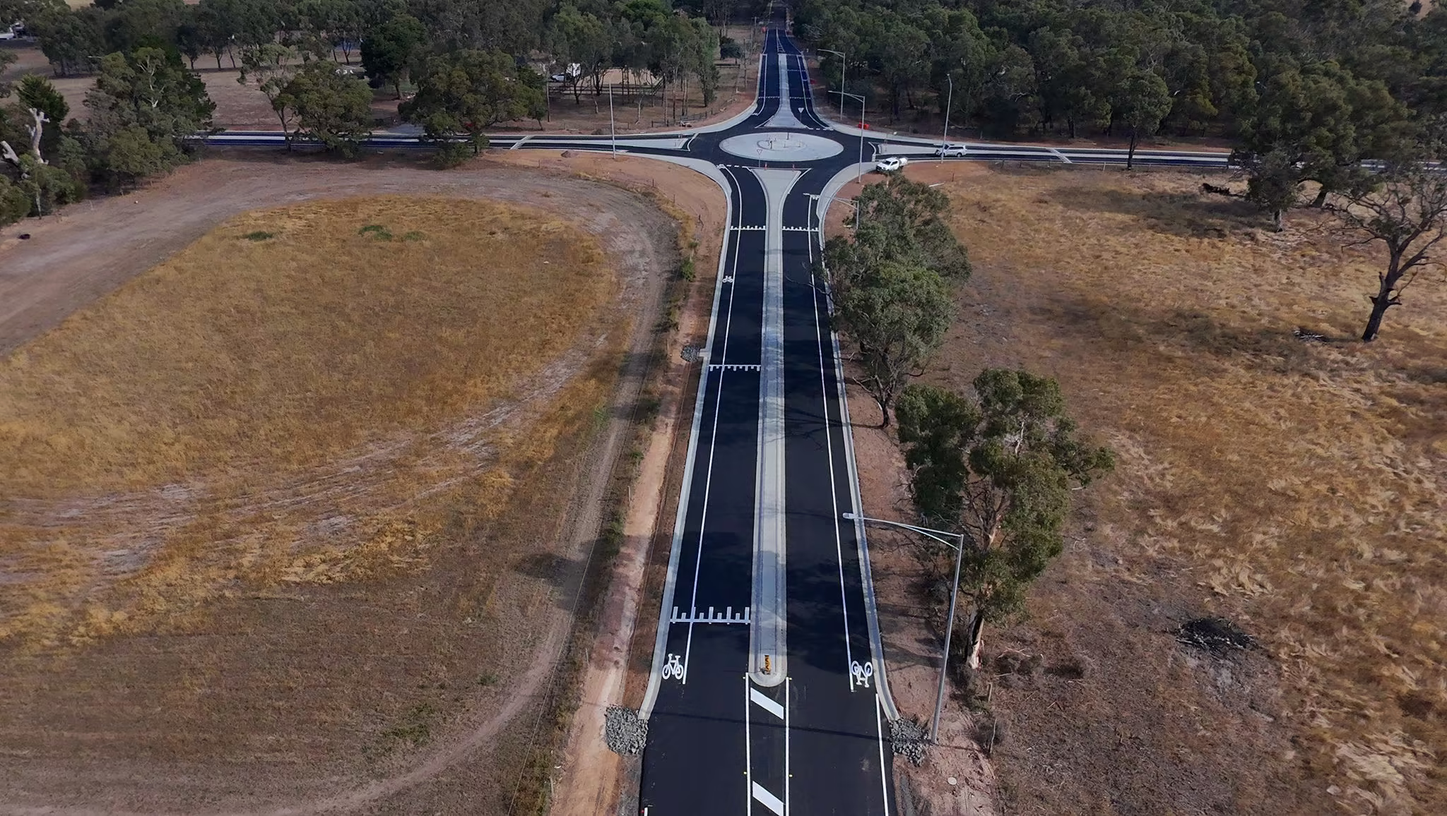 Completed thermoplastic lines and symbols at a roundabout