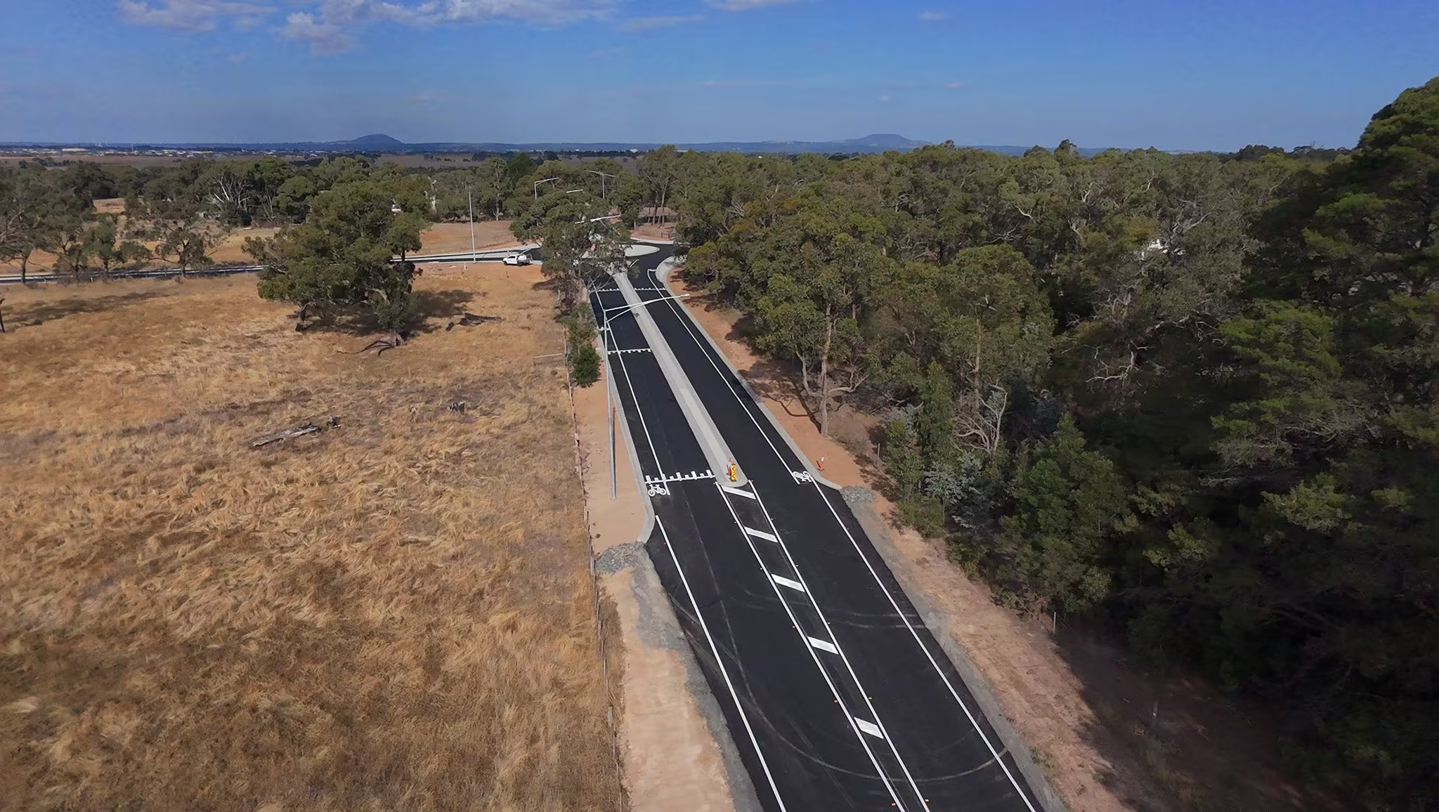 Long-life road markings on a new development